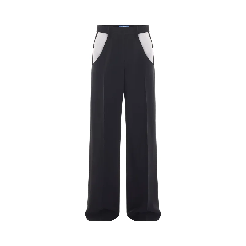 black cut-out trousers